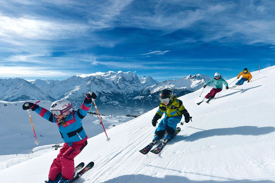 Kidz are skiing in Switzerland